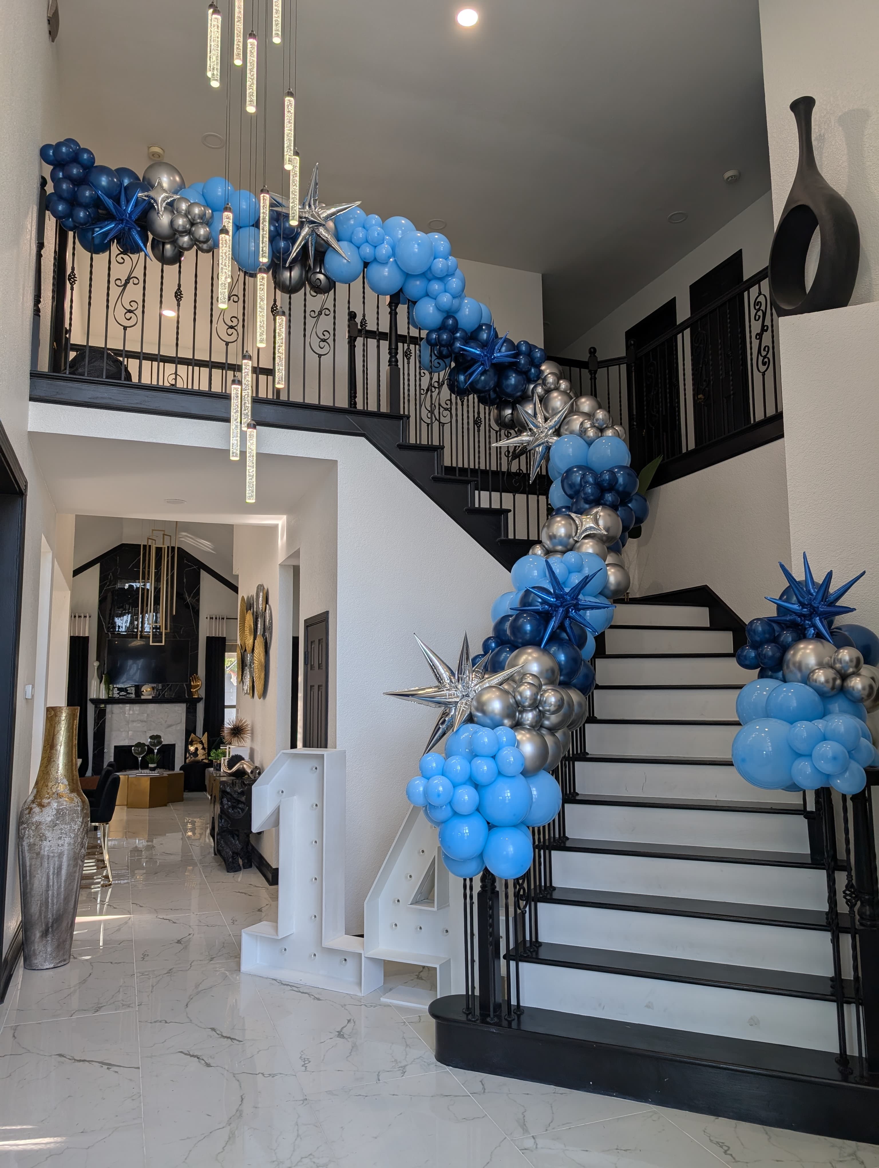 Colorful custom balloon garland by Dazzle Memories