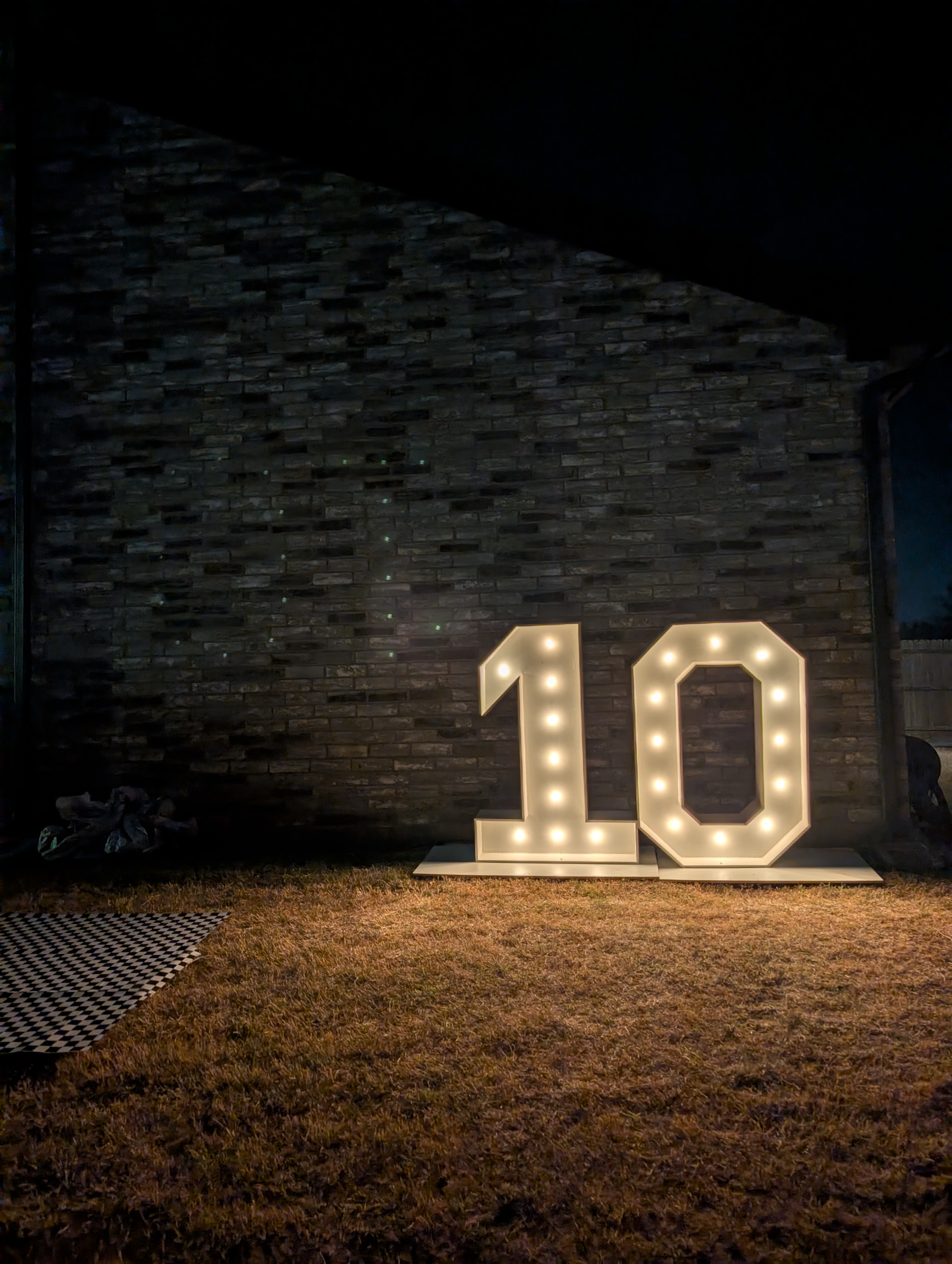 4-foot tall illuminated wood marquee numbers at a Dazzle Memories event